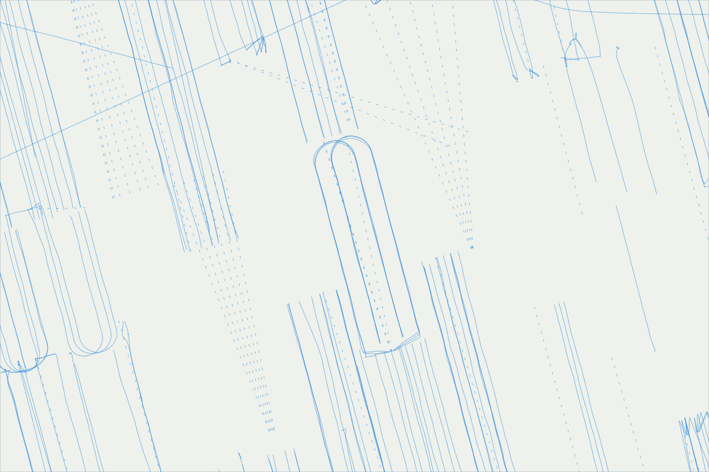A map window over Upton County, Texas. 139 wells are drawn along the as-drilled paths of their directional surveys, and 13 of those turn back beside themselves in a horseshoe shape. 40 more are drawn as a broken straight line between their surface and bottom-hole locations.